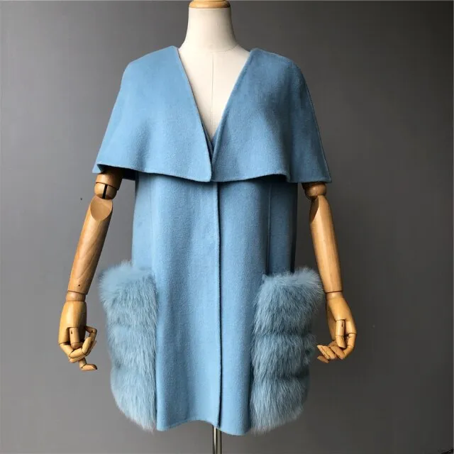 Women's sleeveless jacket with a shawl, with a pocket made of natural fur